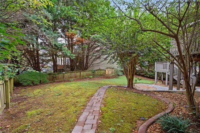 a picture of a bathroom with a white wall and a white wall