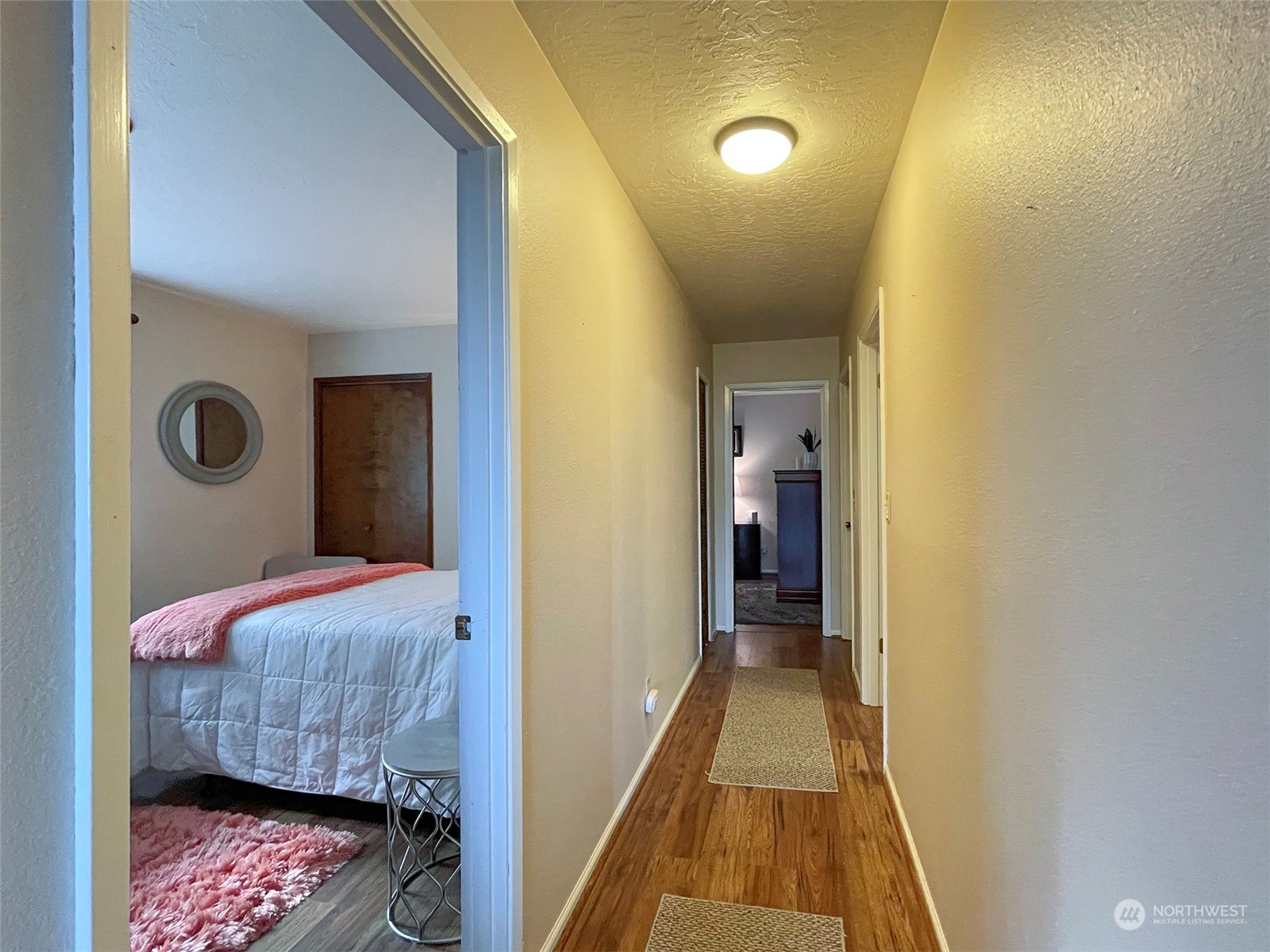 42 Sekiu Airport Road Sekiu, WA 98381 - Photo 11 of 27 a bedroom with a bed and a table