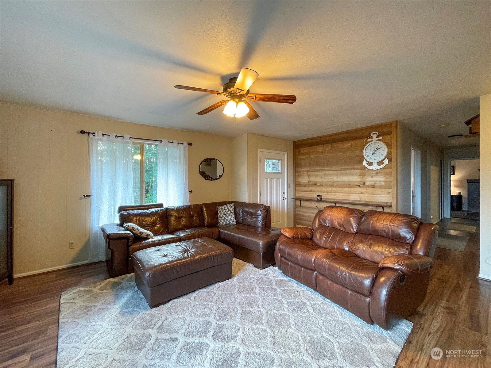 42 Sekiu Airport Road Sekiu, WA 98381 - Photo 5 of 27 a living room with furniture and a ceiling fan