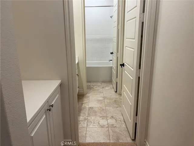 a view of a backyard of the house