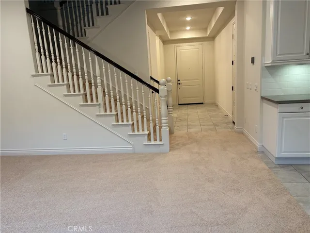 a view of an empty room with closet