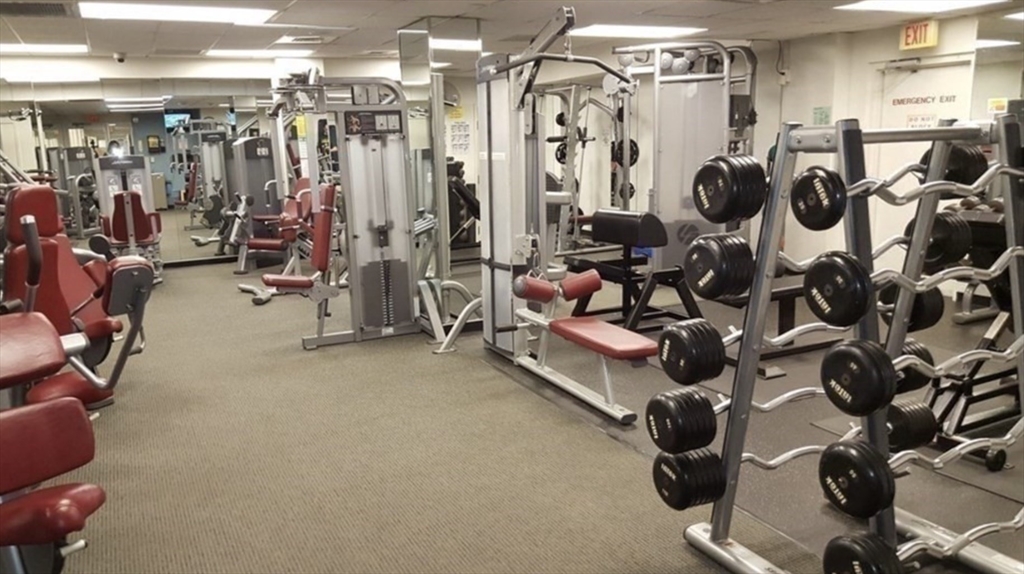 44 Washington Street, Unit 1009 Brookline, MA 02445 - Photo 12 of 12 a view of a room with gym equipment
