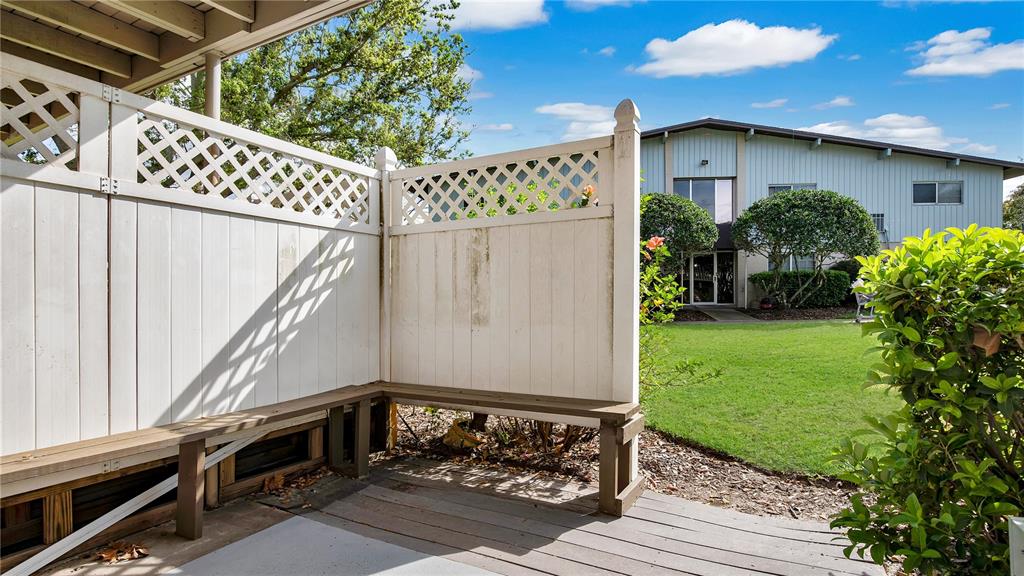 1695 Lee Road, Unit E103 Winter Park, FL 32789 - Photo 12 of 20 a view of a house with a yard