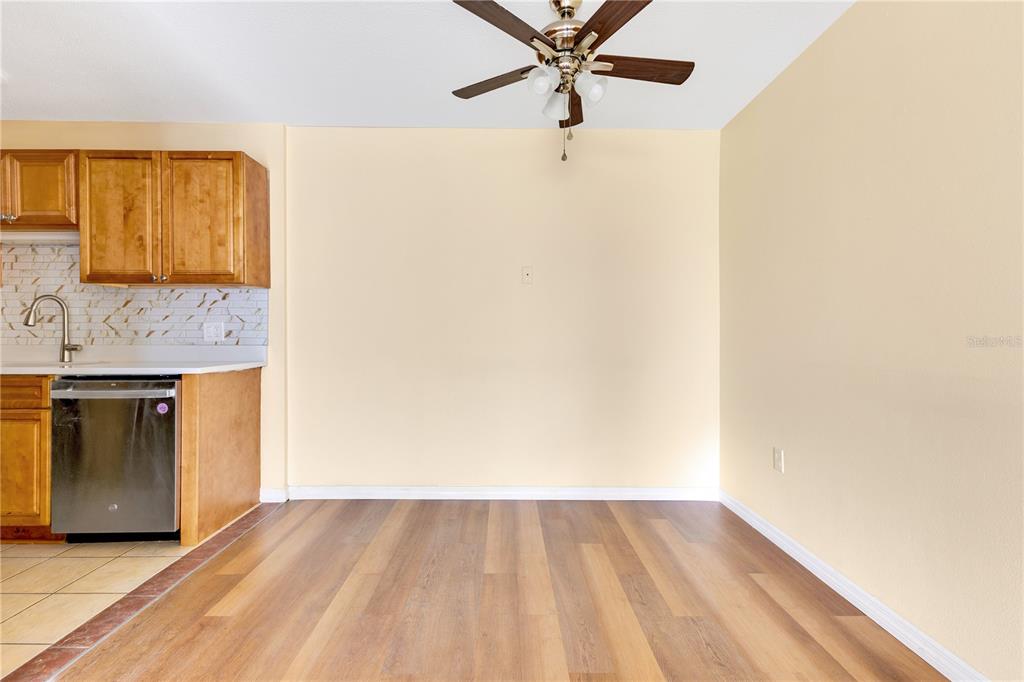 1695 Lee Road, Unit E103 Winter Park, FL 32789 - Photo 15 of 20 a view of a hardwood floor in a room
