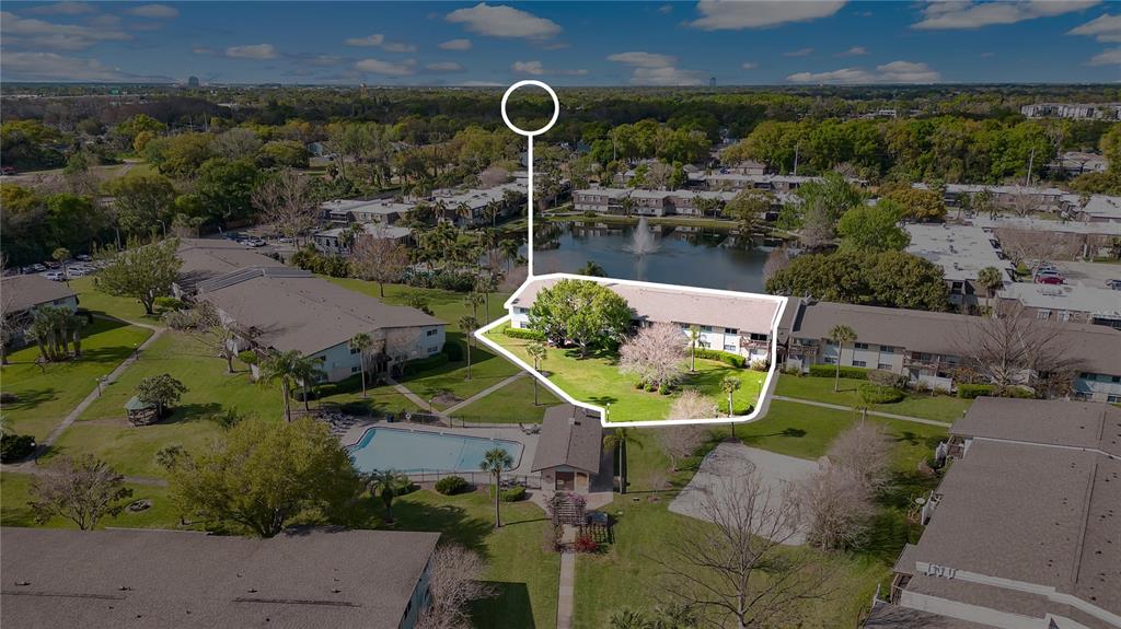 1695 Lee Road, Unit E103 Winter Park, FL 32789 - Photo 20 of 20 an aerial view of a house with outdoor space