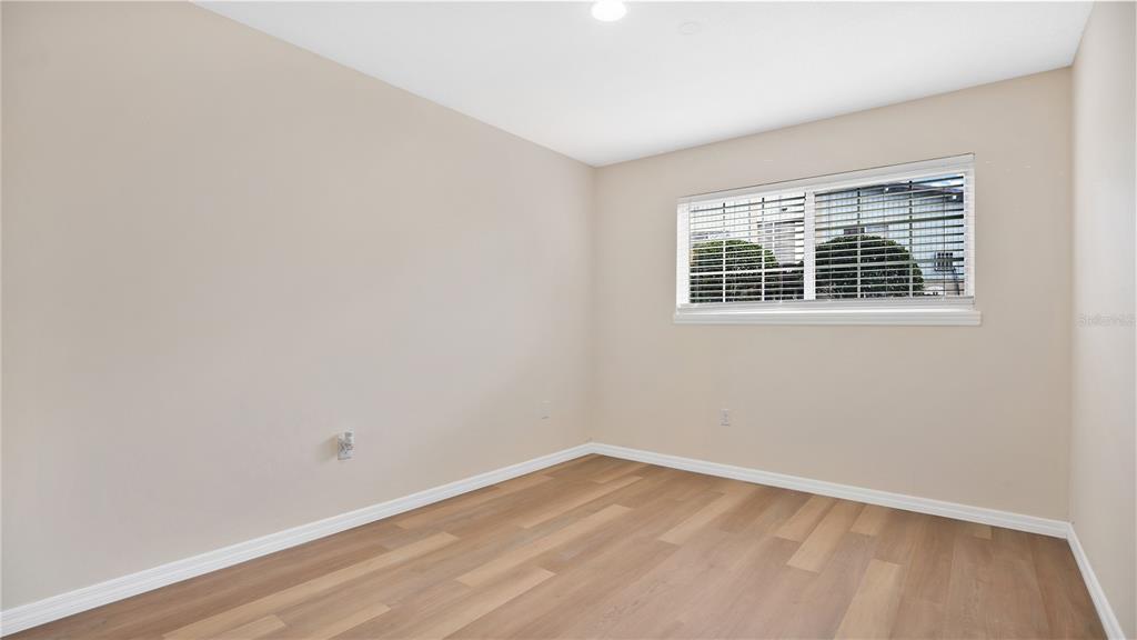 1695 Lee Road, Unit E103 Winter Park, FL 32789 - Photo 7 of 20 an empty room with a window