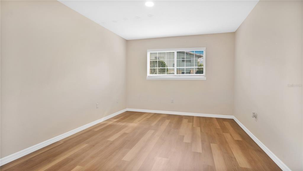 1695 Lee Road, Unit E103 Winter Park, FL 32789 - Photo 8 of 20 an empty room with a window