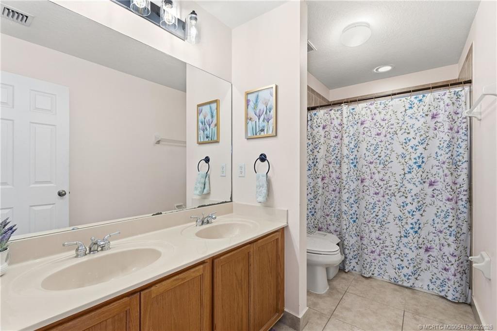 4454 Southeast Graham Drive Stuart, FL 34997 - Photo 14 of 24 Master Bath Virtually Staged