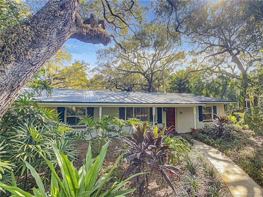 9 Ridgeview Road North Stuart, FL 34996 - Photo 1 of 20 a view of house with a yard