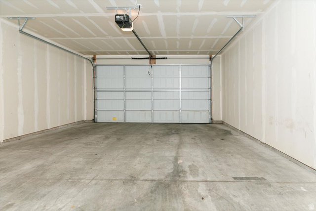 226 South 600 West Logan, UT 84321 - Photo 9 of 25 Garage featuring a garage door opener
