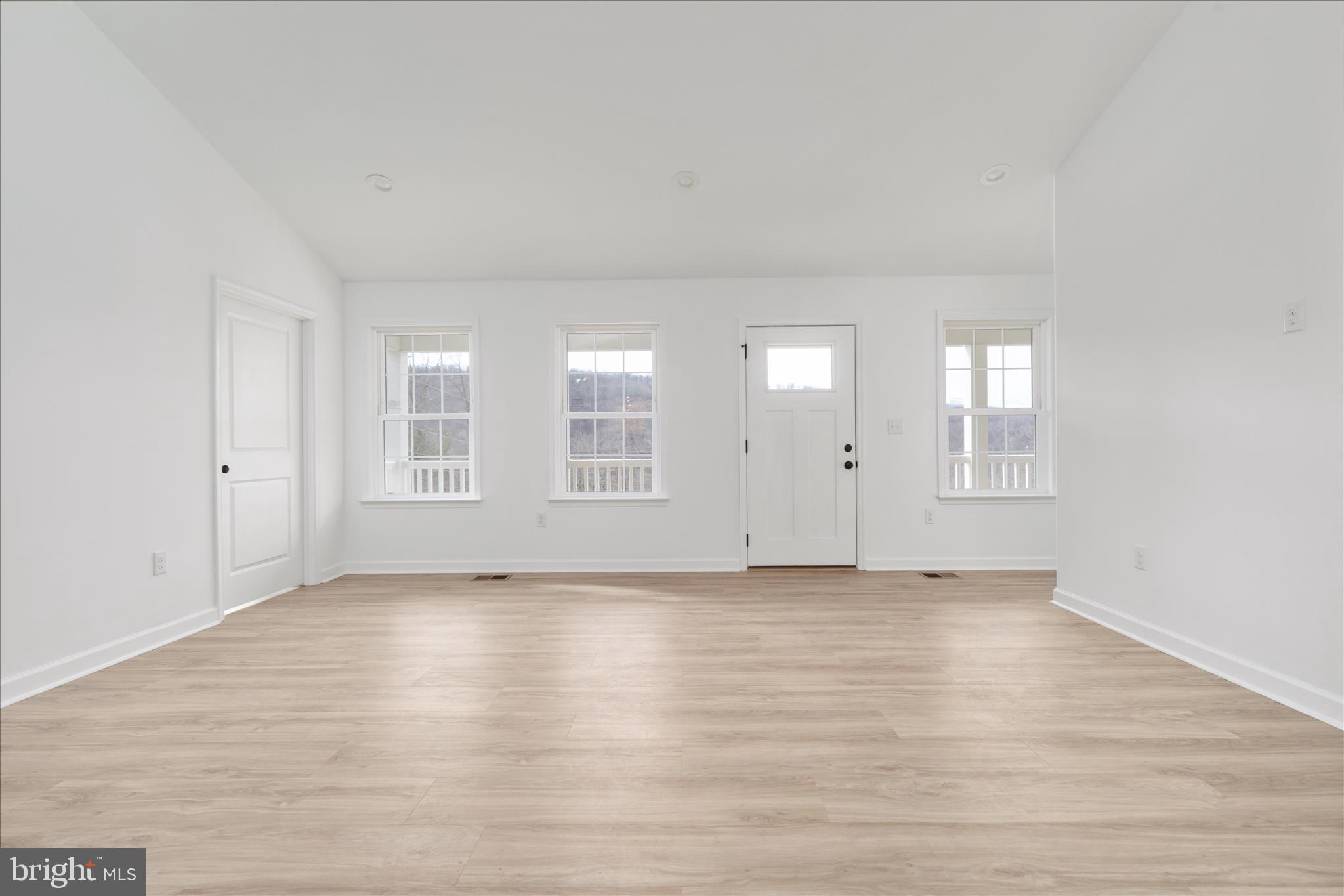66 Bluejay Court Front Royal, VA 22630 - Photo 14 of 81 an empty room with wooden floor and windows