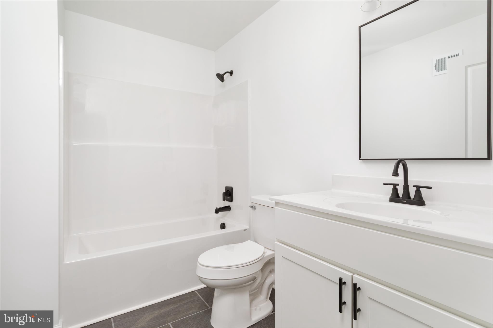 66 Bluejay Court Front Royal, VA 22630 - Photo 30 of 81 a bathroom with a sink a toilet and a bathtub