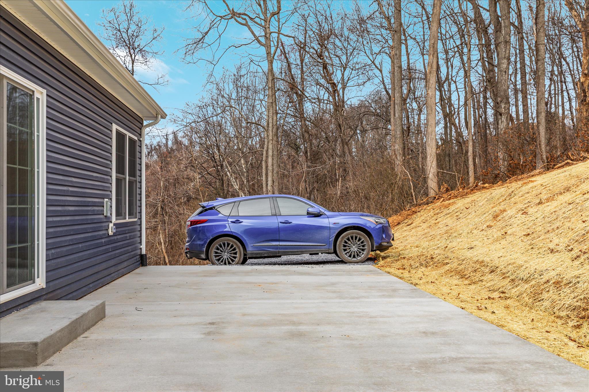 66 Bluejay Court Front Royal, VA 22630 - Photo 40 of 81 a view of a car in front of a house