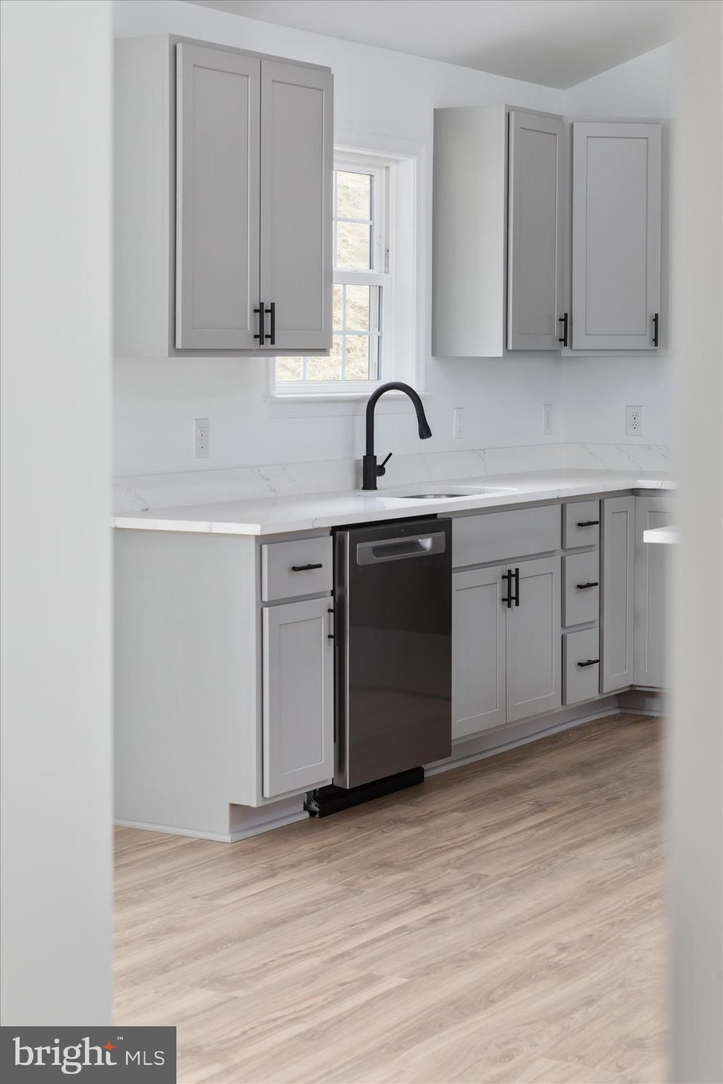 66 Bluejay Court Front Royal, VA 22630 - Photo 47 of 81 a kitchen with stainless steel appliances granite countertop a sink and cabinets