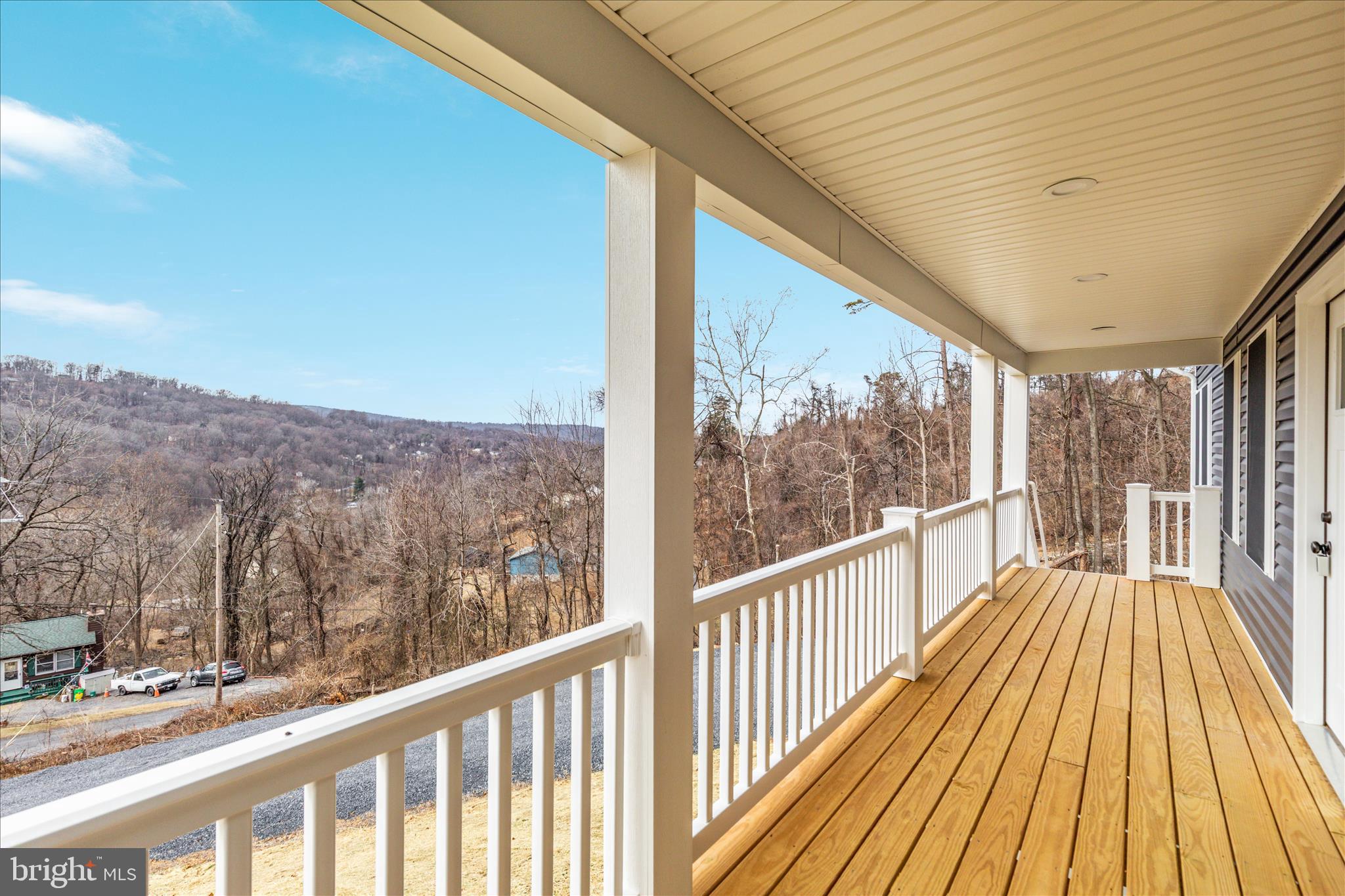 66 Bluejay Court Front Royal, VA 22630 - Photo 5 of 81 a view of a balcony with wooden floor