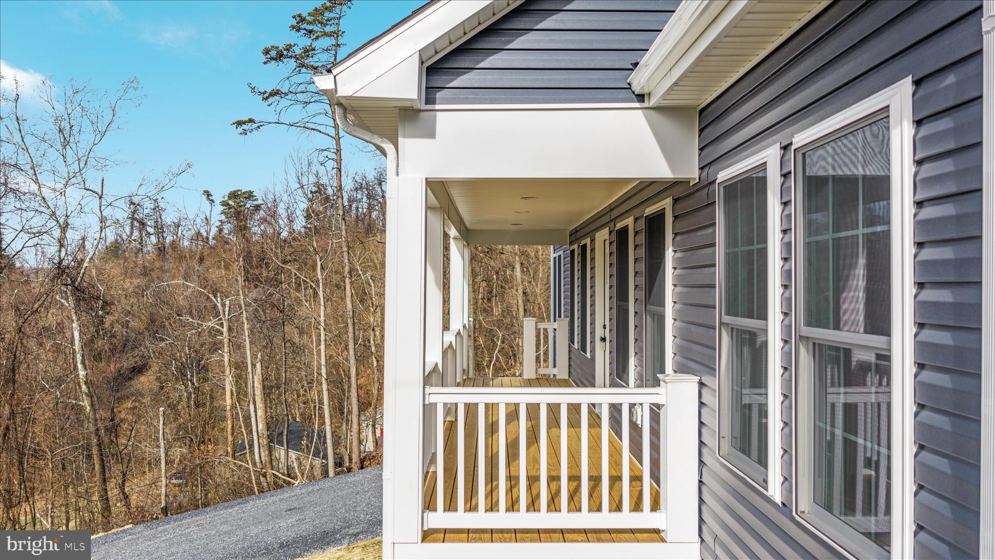 66 Bluejay Court Front Royal, VA 22630 - Photo 52 of 81 a view of a balcony with furniture and floor to ceiling window