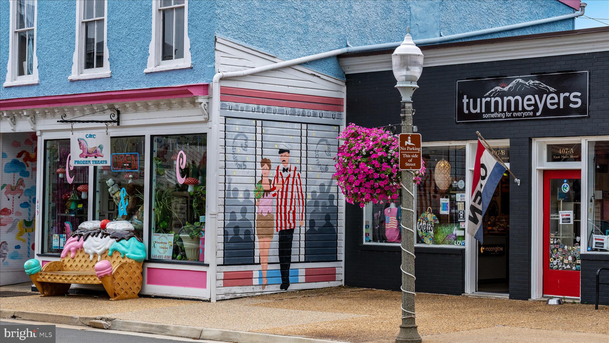 66 Bluejay Court Front Royal, VA 22630 - Photo 71 of 81 a front view of a building with retail shops