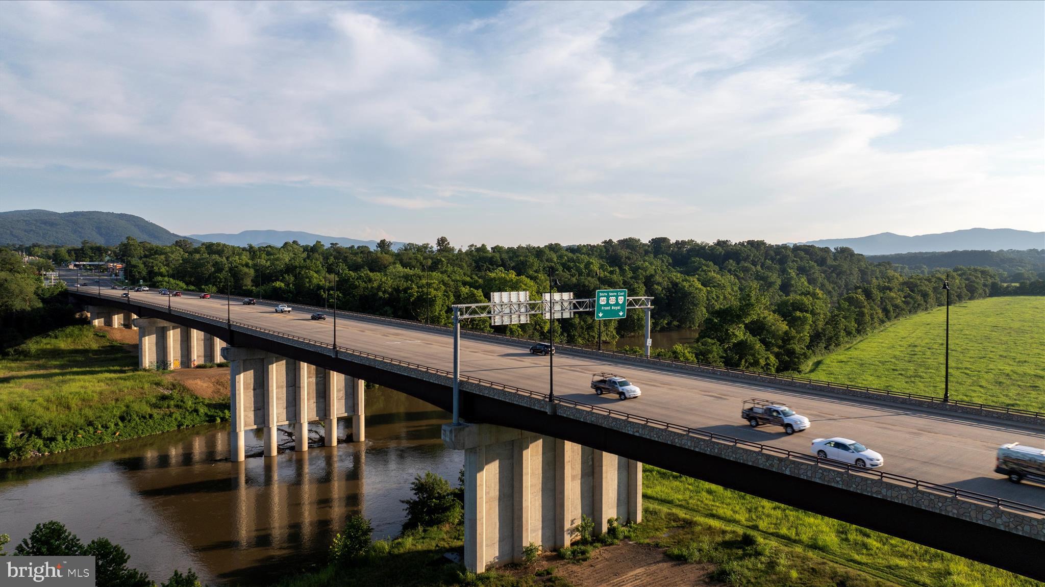 66 Bluejay Court Front Royal, VA 22630 - Photo 80 of 81 a view of a balcony with wooden floor and lake view