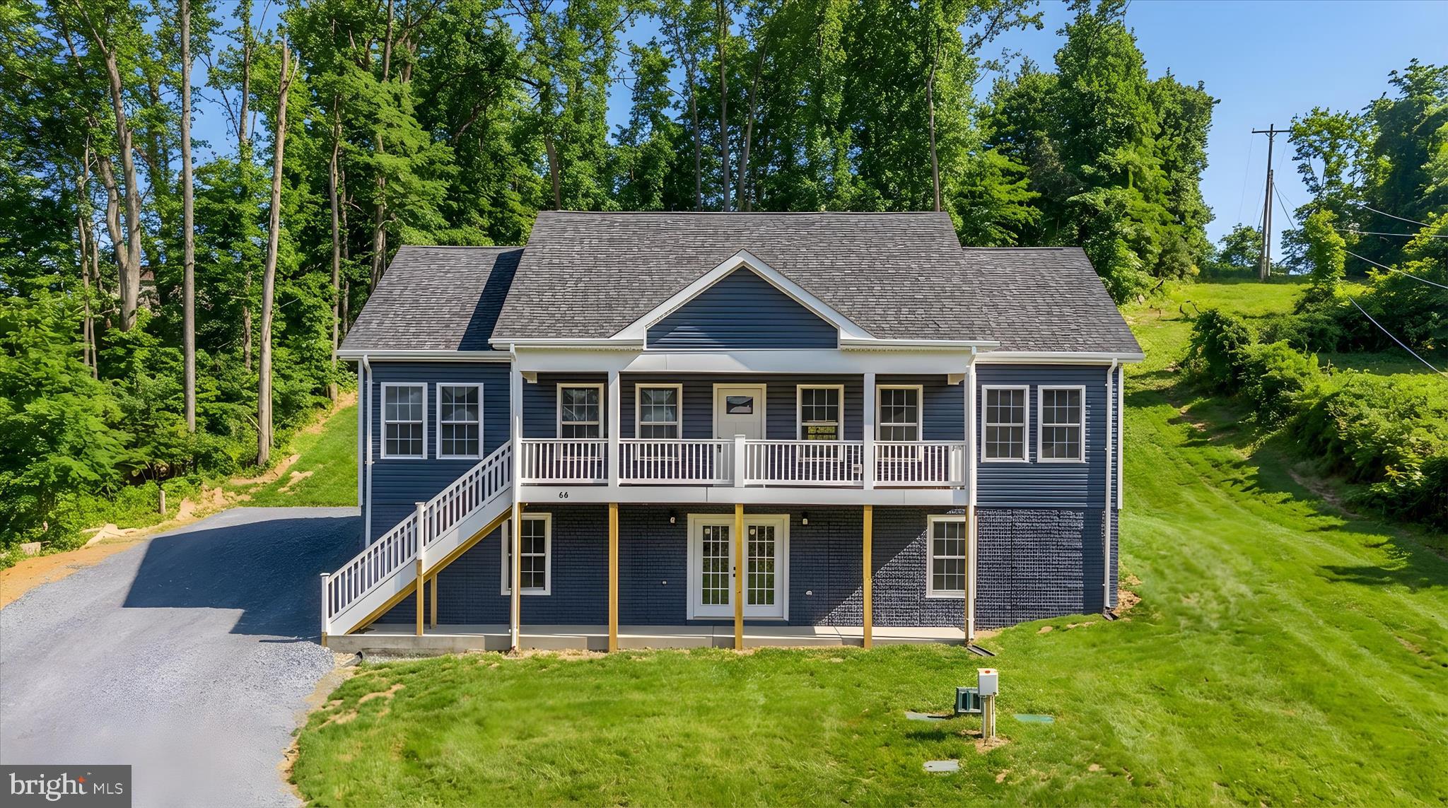 66 Bluejay Court Front Royal, VA 22630 - Photo 8 of 81 a house with tall trees in the background