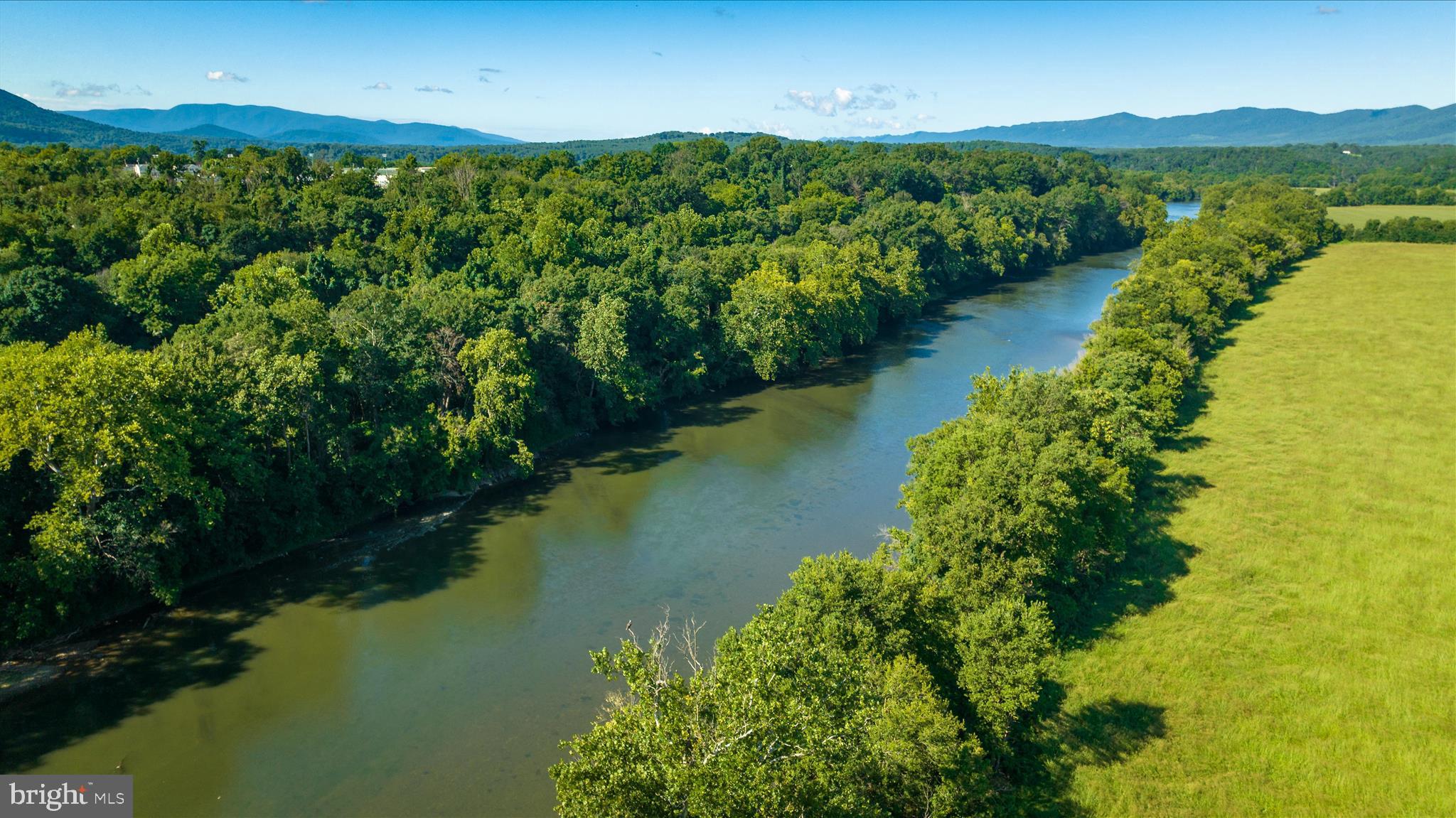 66 Bluejay Court Front Royal, VA 22630 - Photo 81 of 81 a view of a lake with a mountain in the background