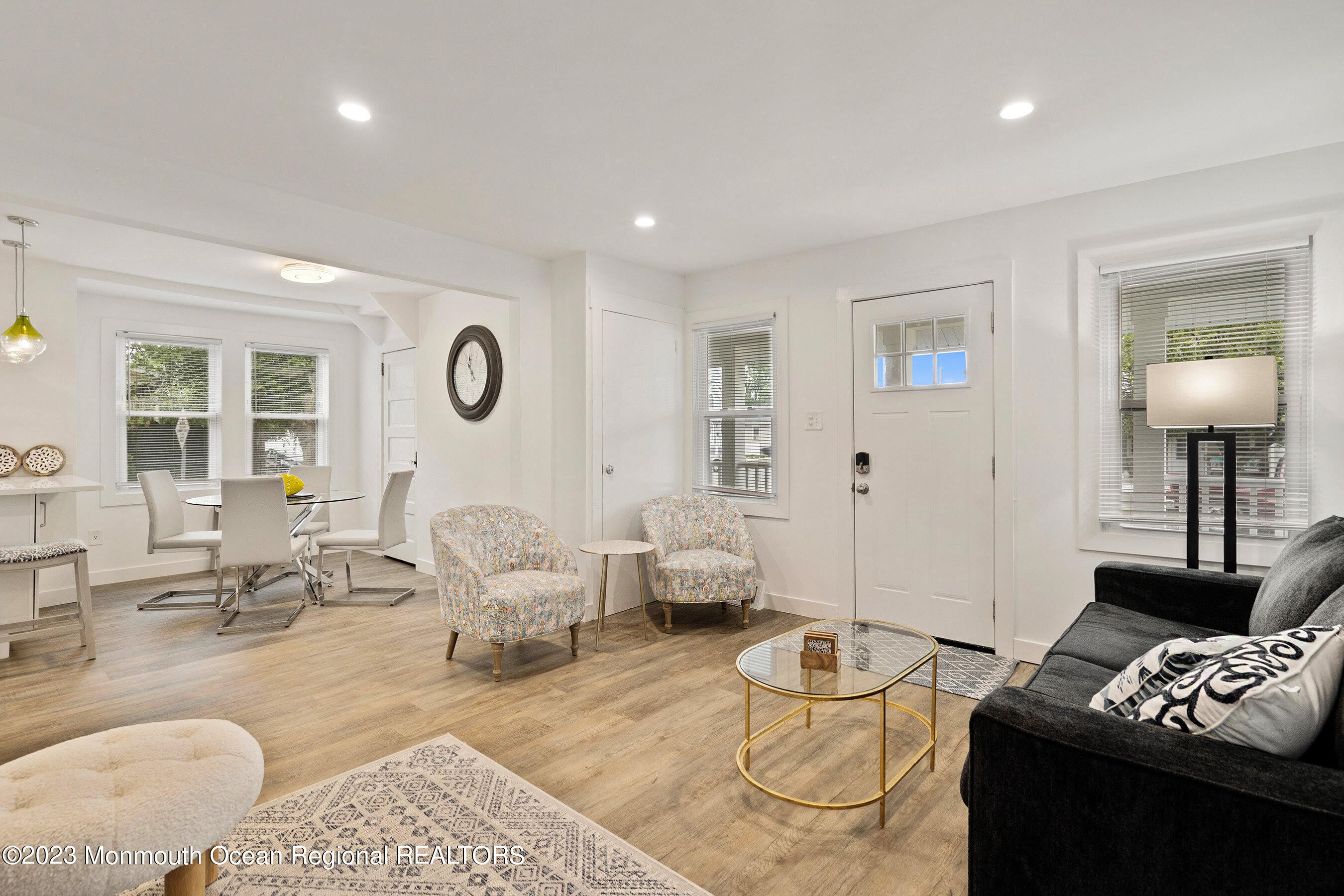 1401 B Street, Unit DOWNSTAIRS Belmar, NJ 07719 - Photo 5 of 12 a living room with furniture and a lamp