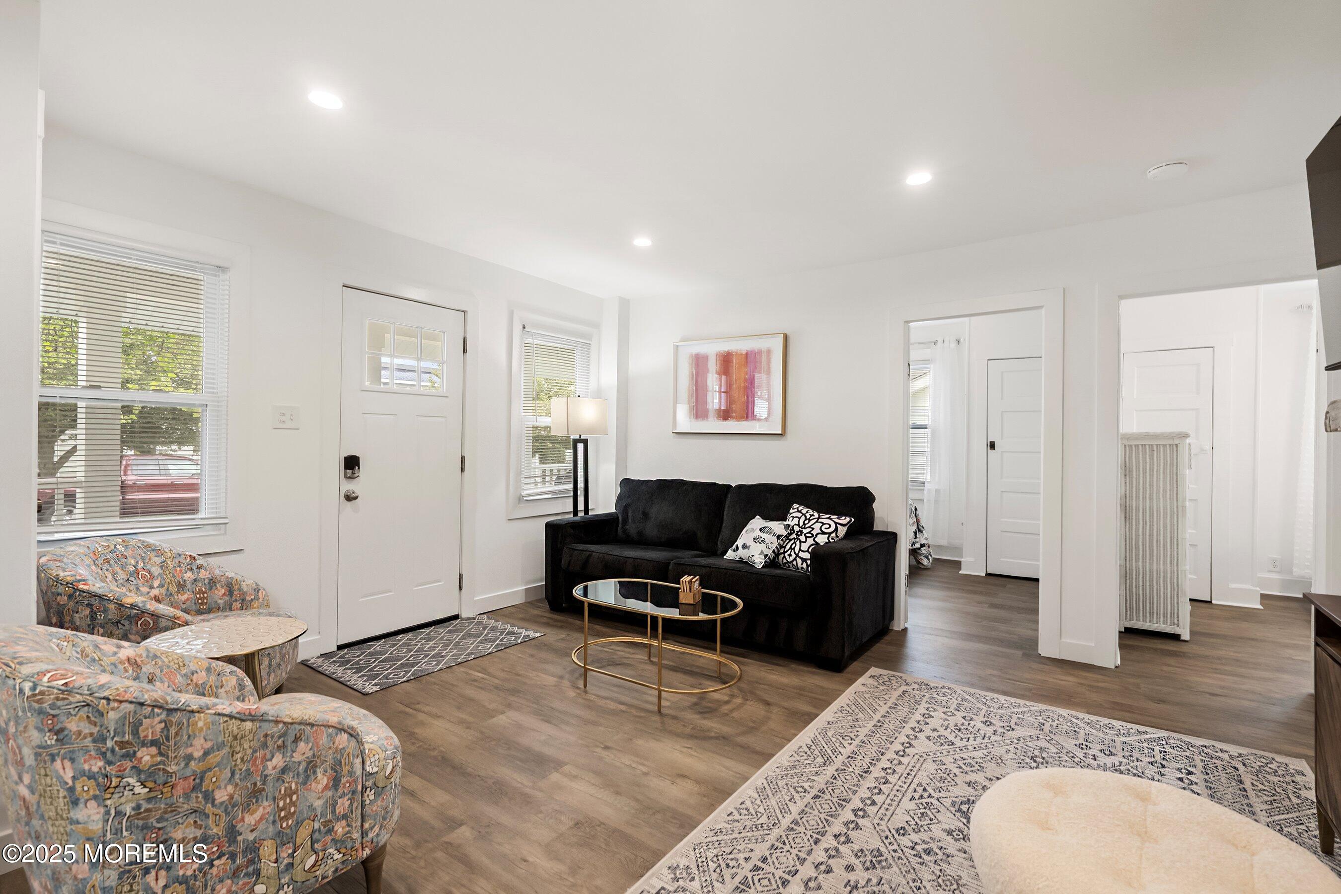 1401 B Street, Unit DOWNSTAIRS Belmar, NJ 07719 - Photo 6 of 12 a living room with furniture and a couch