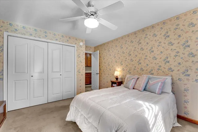 an aerial view of a house with outdoor space