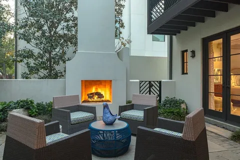 a outdoor living space with furniture and a potted plant