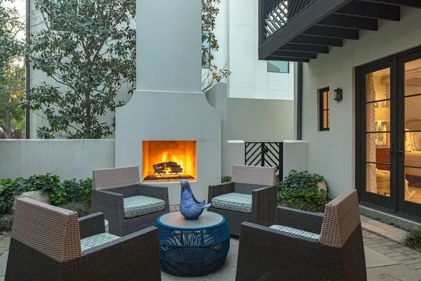 a outdoor living space with furniture and a potted plant