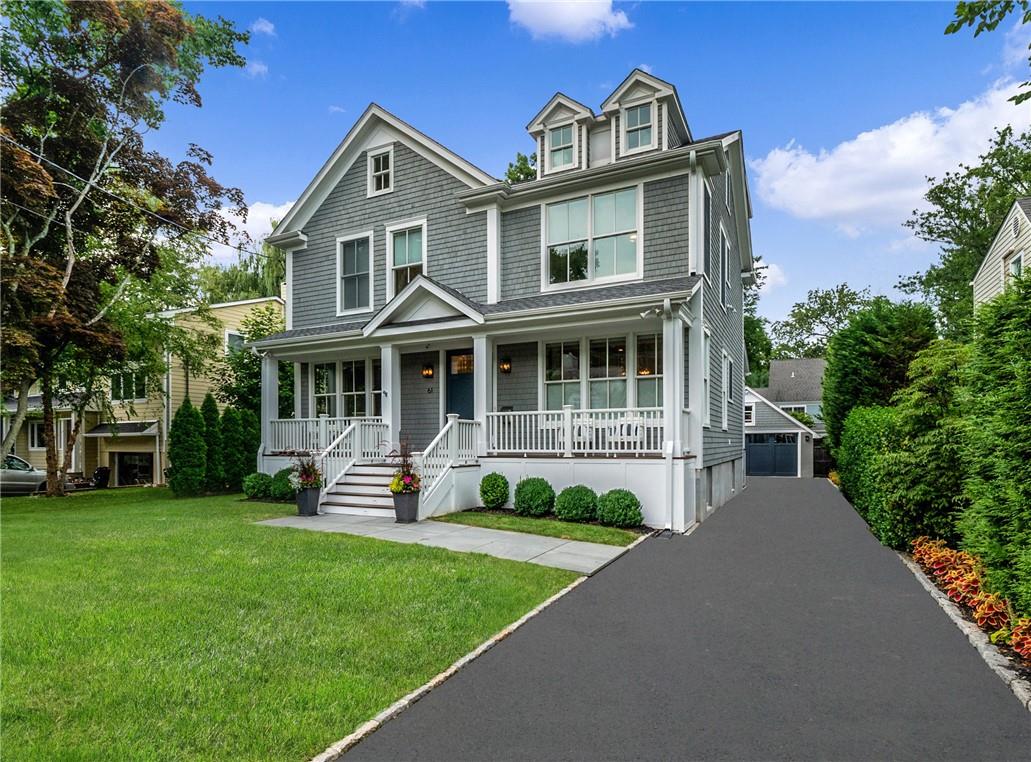 61 Intervale Place Rye, NY 10580 - Photo 1 of 1 a front view of a house with a yard
