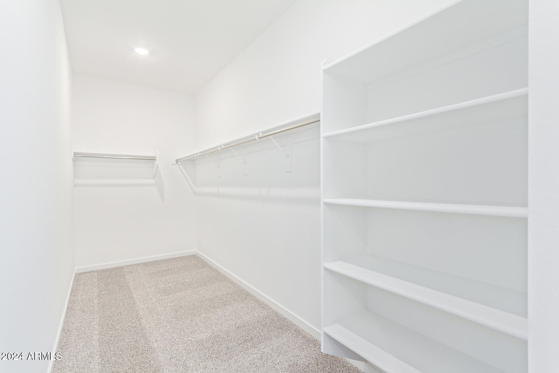 17629 West Madison Street Goodyear, AZ 85338 - Photo 20 of 46 a view of an empty walk in closet
