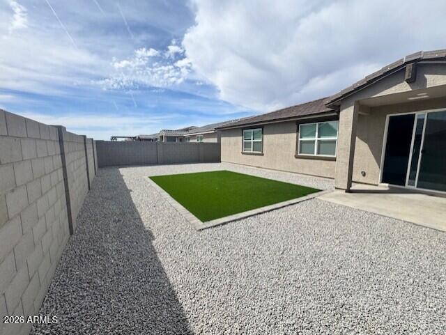 17629 West Madison Street Goodyear, AZ 85338 - Photo 31 of 46 a view of a house with a yard