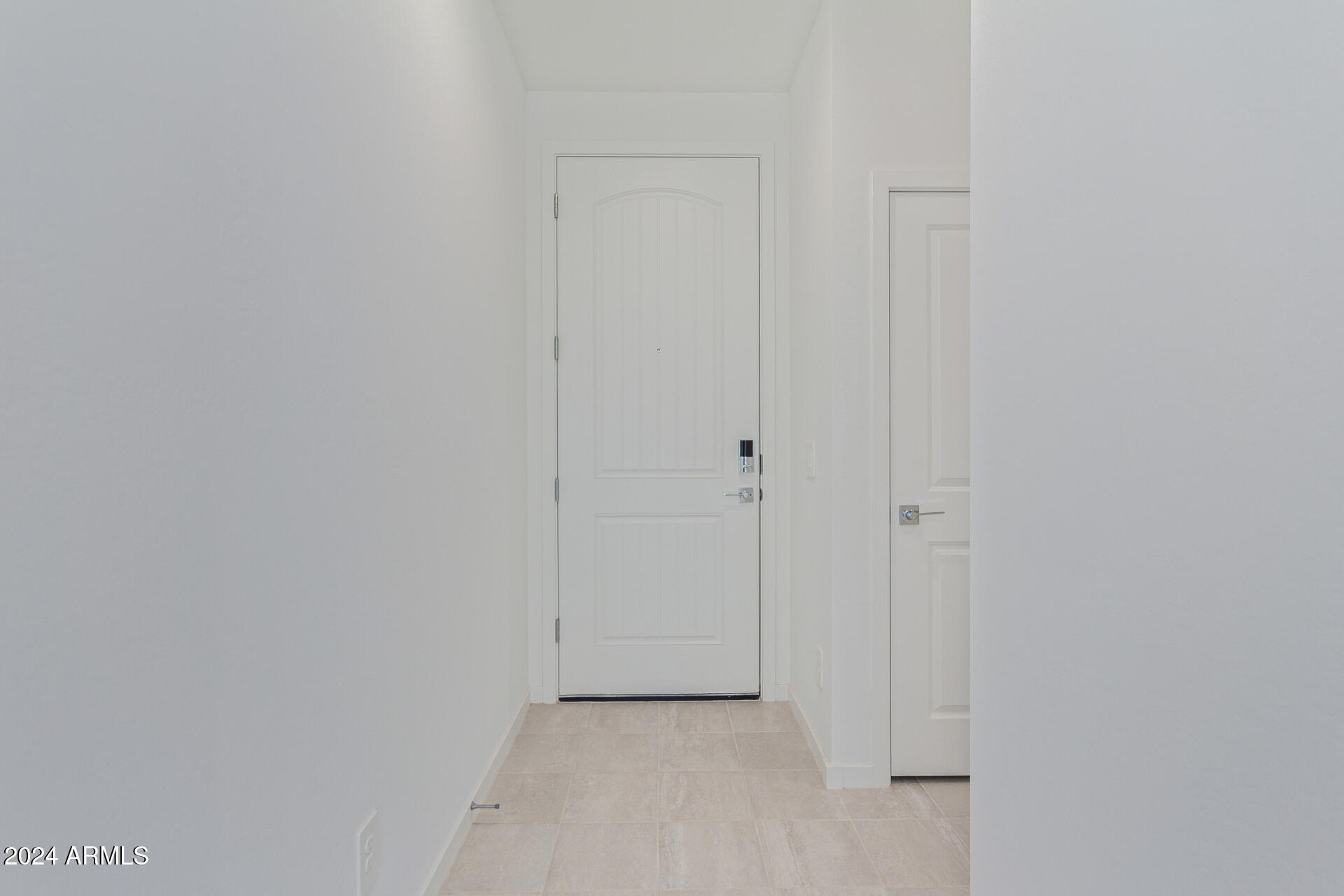 17629 West Madison Street Goodyear, AZ 85338 - Photo 4 of 46 a view of a hallway