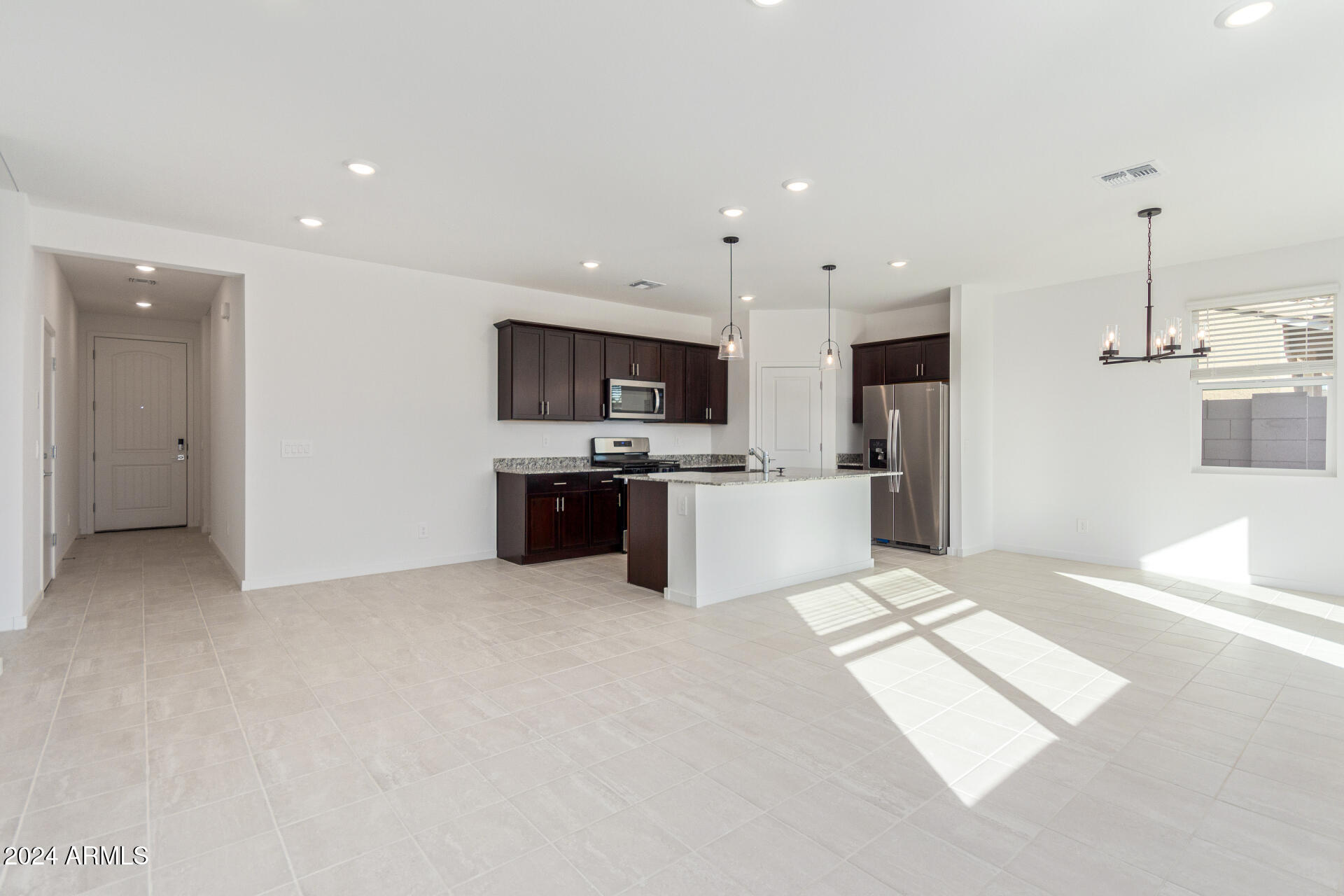 17629 West Madison Street Goodyear, AZ 85338 - Photo 9 of 30 Great Room / Kitchen