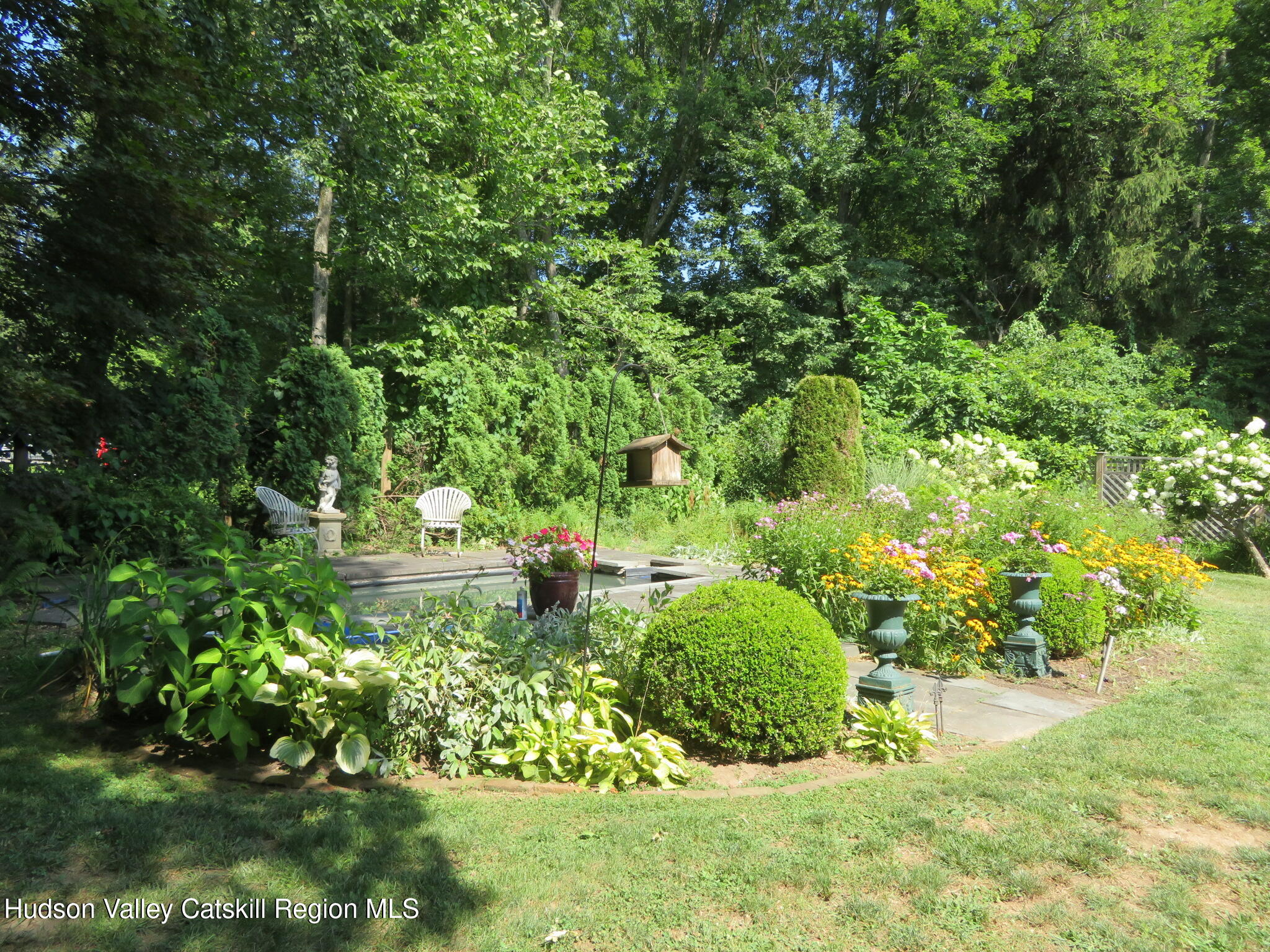 856 Elting Road Rosendale, NY 12472 - Photo 53 of 84 a view of a garden with a fountain