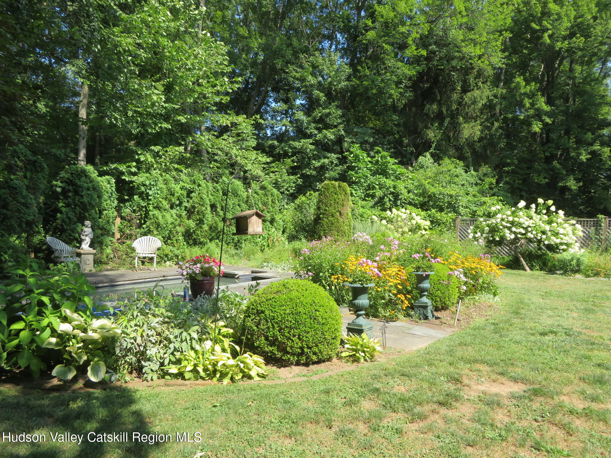 856 Elting Road Rosendale, NY 12472 - Photo 54 of 84 a view of a garden with a fountain
