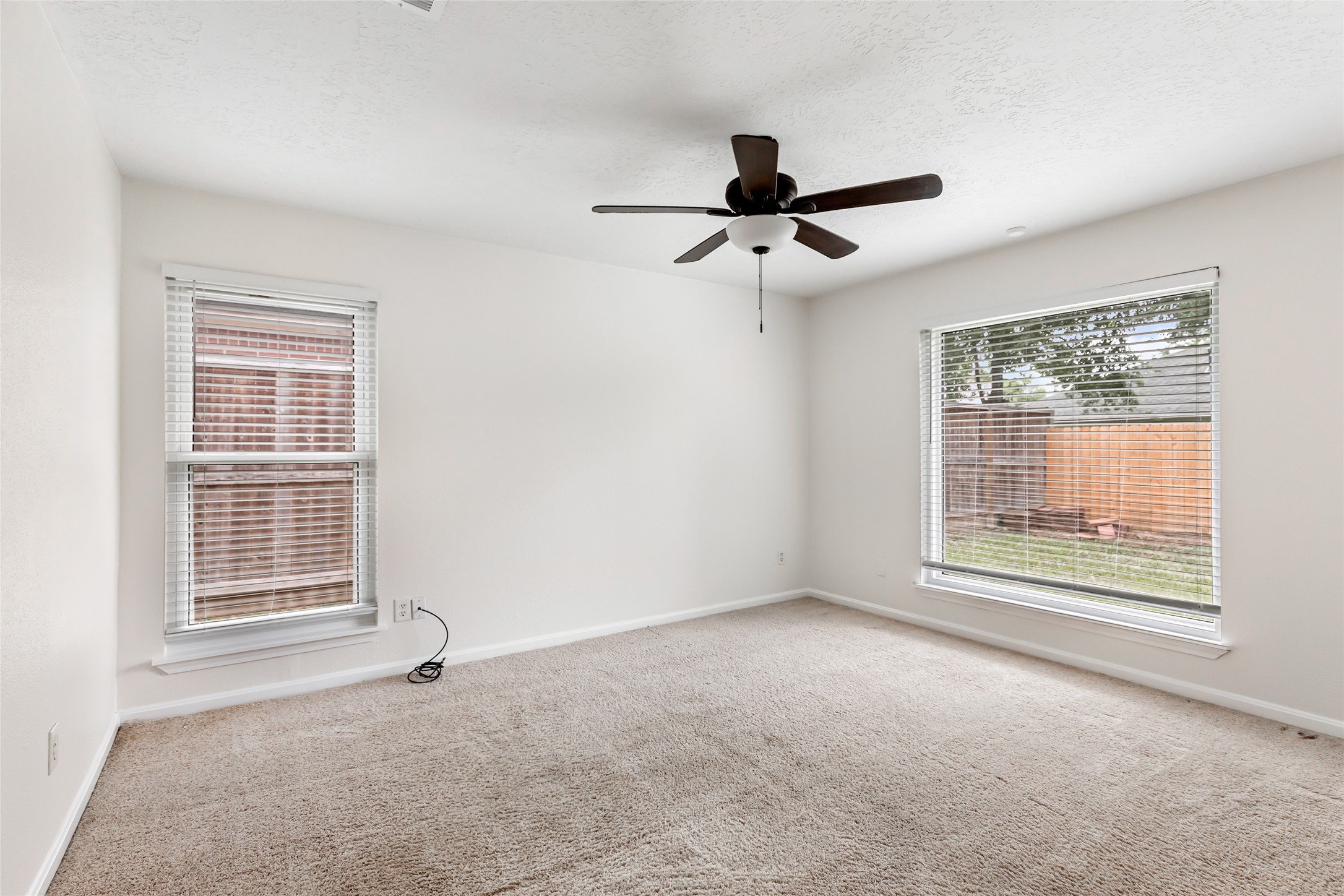 2810 Spring Dusk Drive Spring, TX 77373 - Photo 17 of 30 a view of an empty room with a window