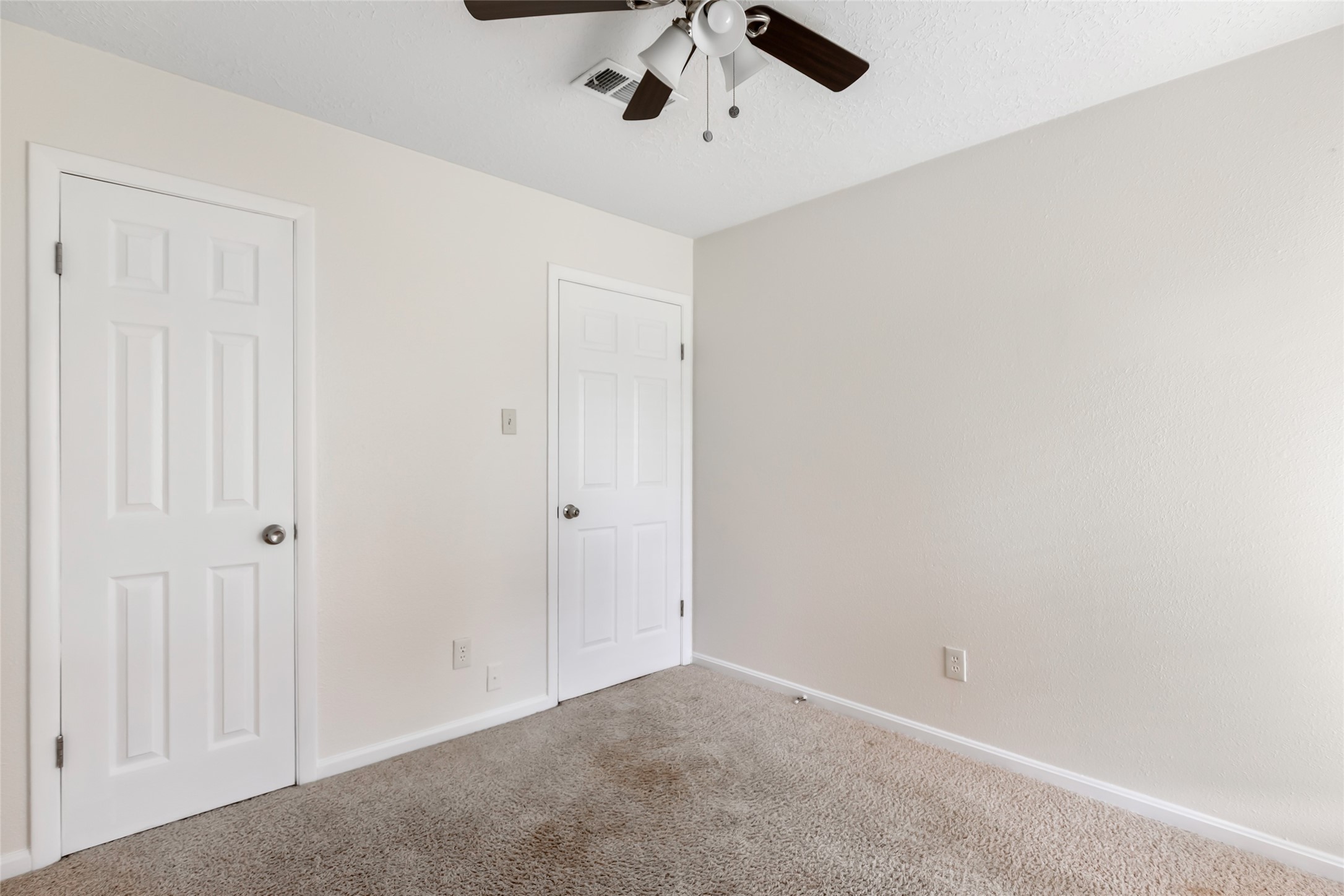2810 Spring Dusk Drive Spring, TX 77373 - Photo 19 of 30 an empty room with a ceiling fan and window