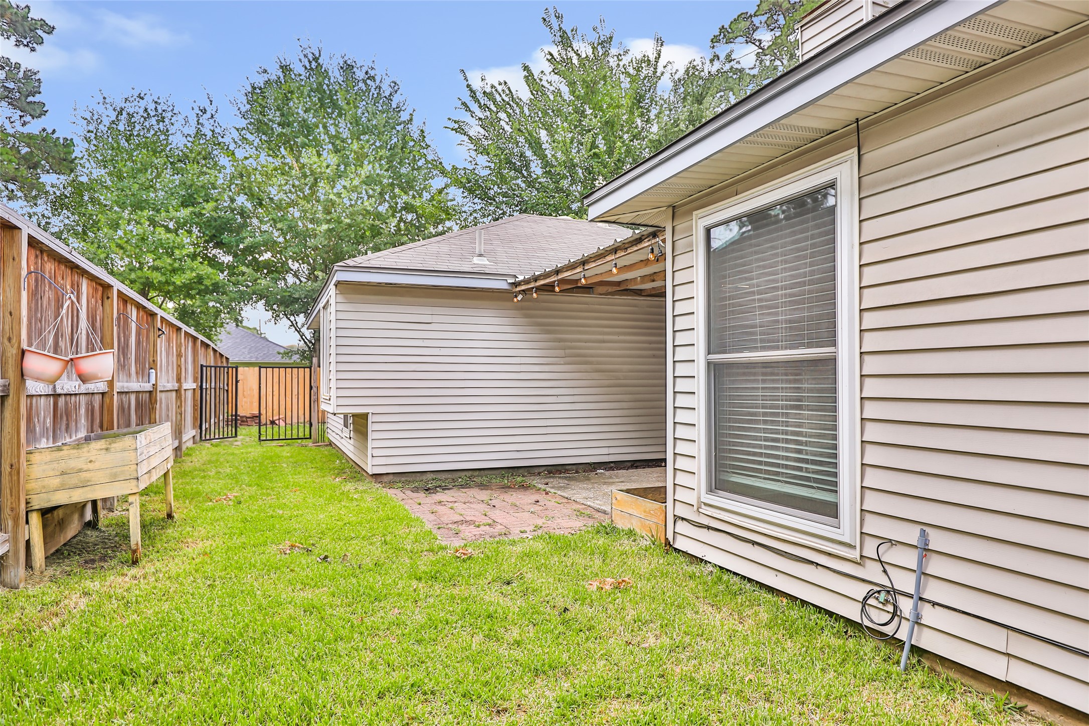 2810 Spring Dusk Drive Spring, TX 77373 - Photo 24 of 30 a view of backyard with a garden and plants