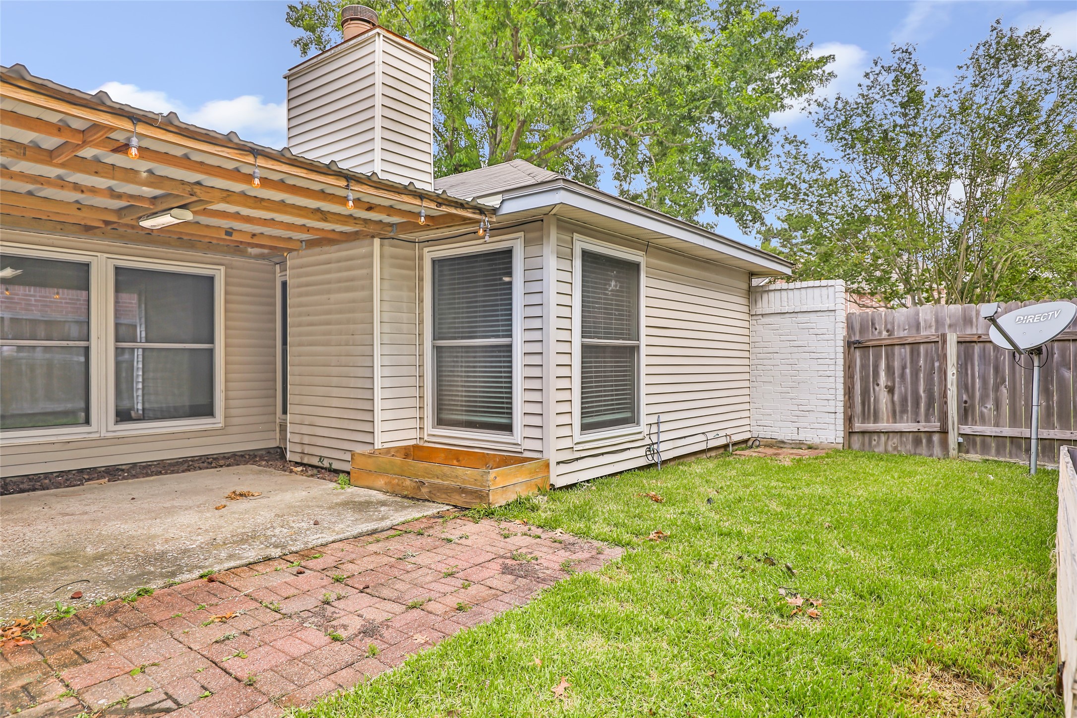 2810 Spring Dusk Drive Spring, TX 77373 - Photo 25 of 30 a view of a house with a yard and wooden fence