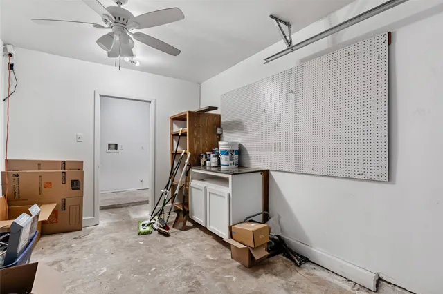 a view of storage and utility room with washer and dryer