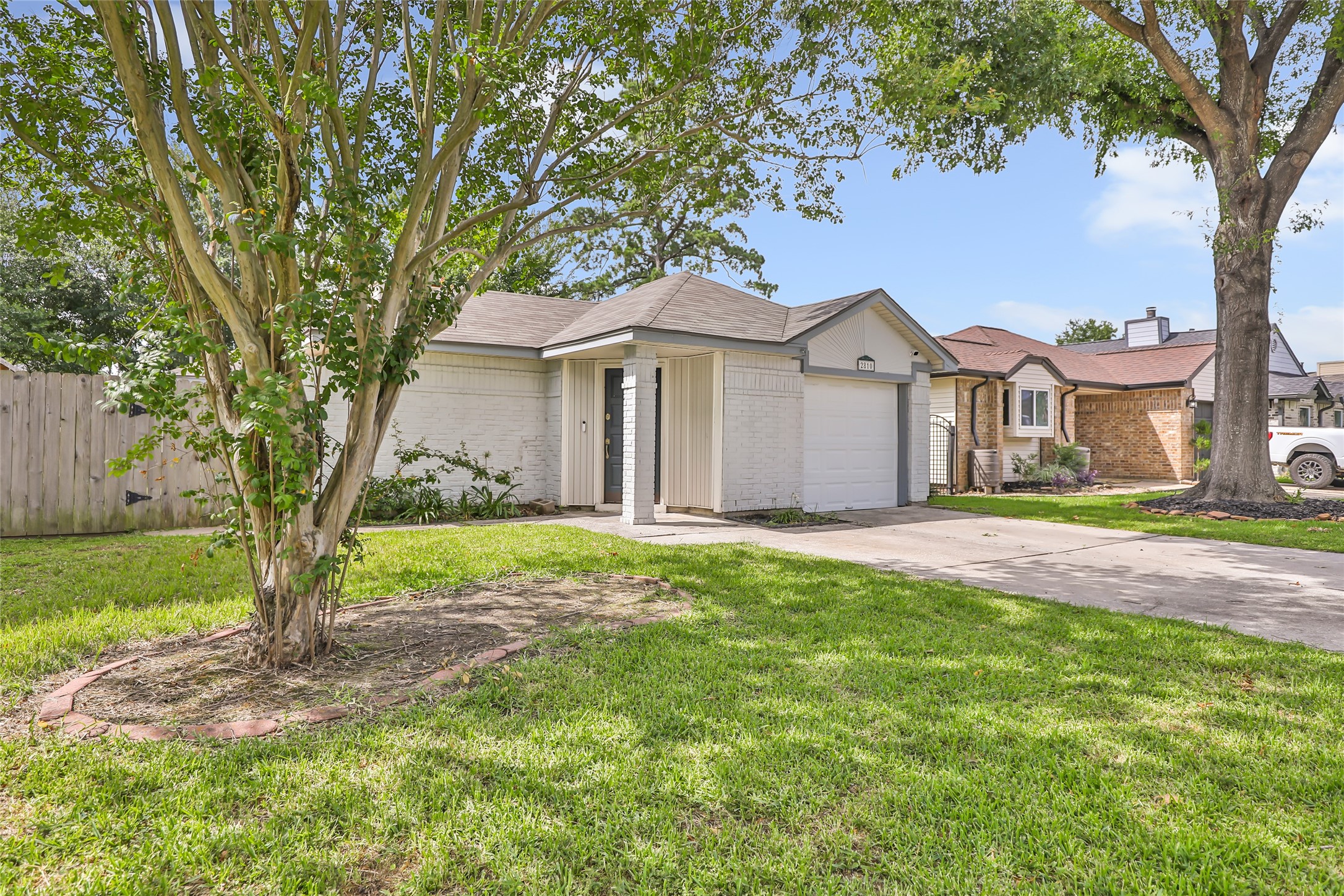 2810 Spring Dusk Drive Spring, TX 77373 - Photo 4 of 30 a front view of a house with garden