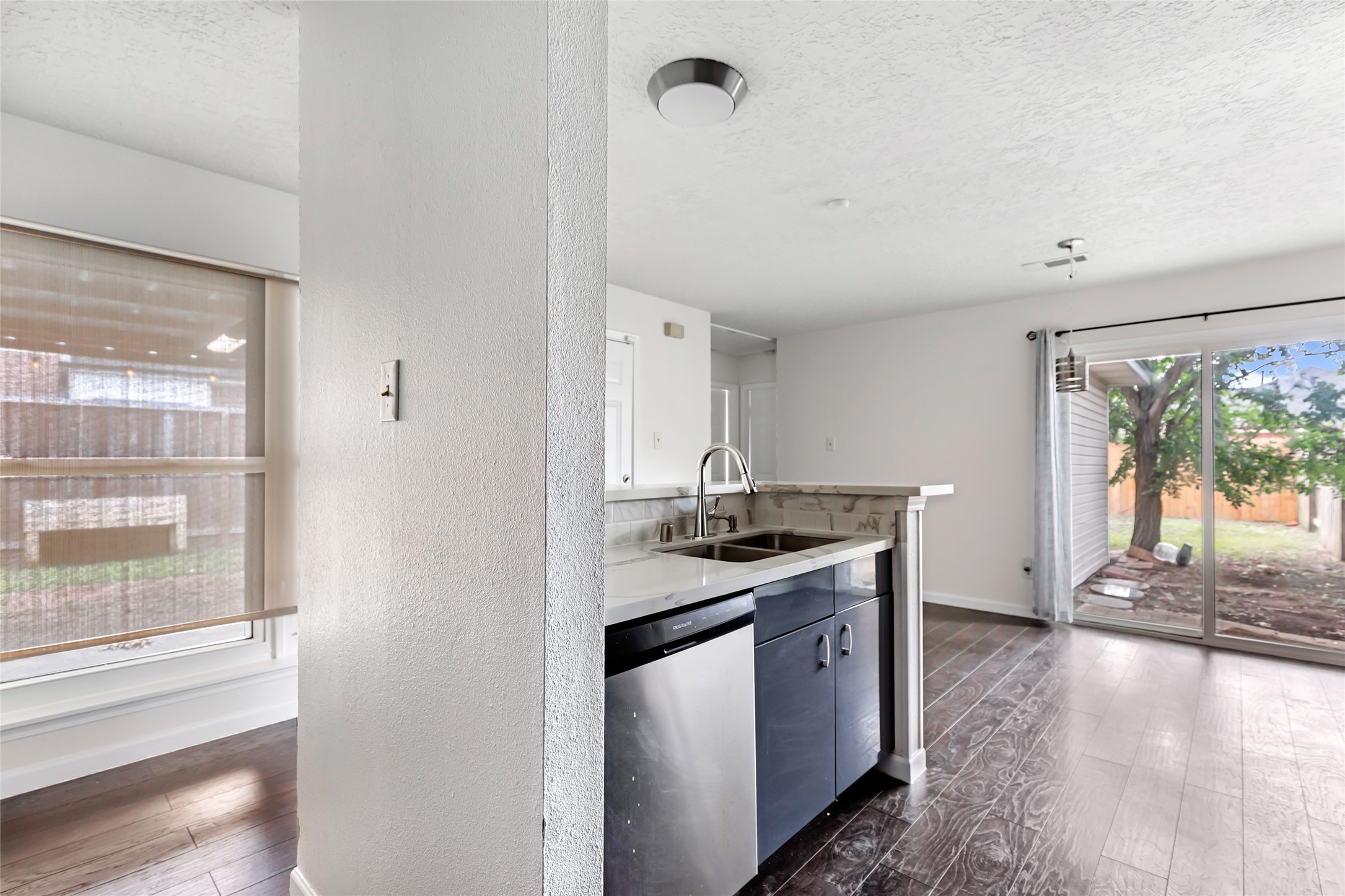 2810 Spring Dusk Drive Spring, TX 77373 - Photo 10 of 30 a kitchen with stainless steel appliances granite countertop a stove and a sink