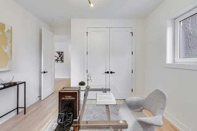 a view of a livingroom with furniture and wooden floor
