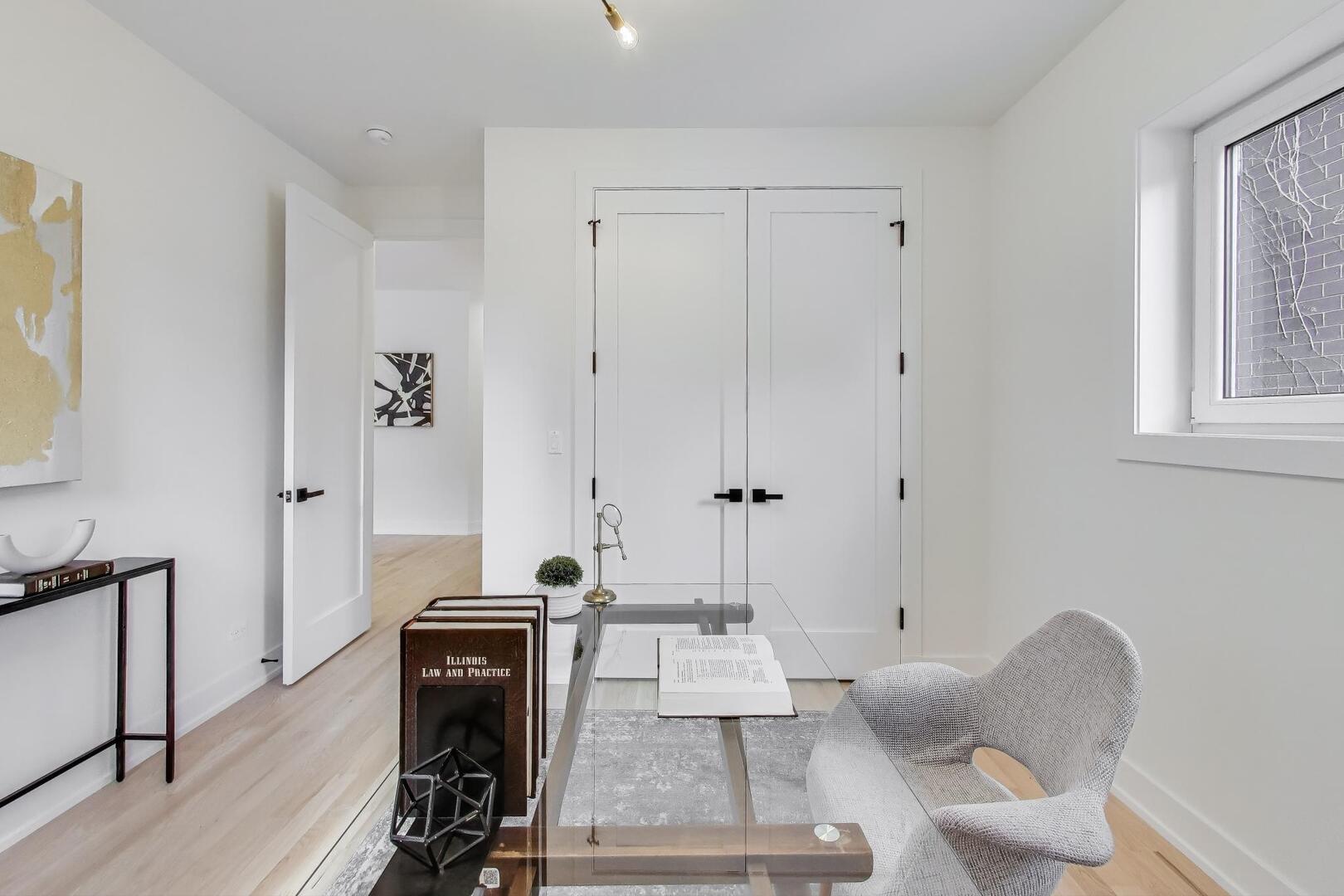2147 West Adams Street, Unit 1S Chicago, IL 60612 - Photo 14 of 44 a view of a livingroom with furniture and wooden floor