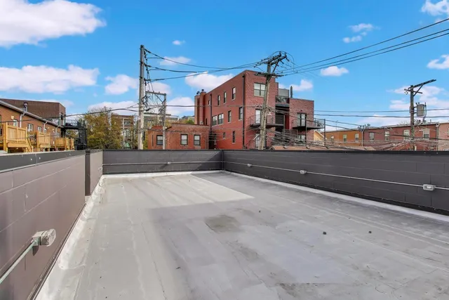 a view of a terrace with a city view