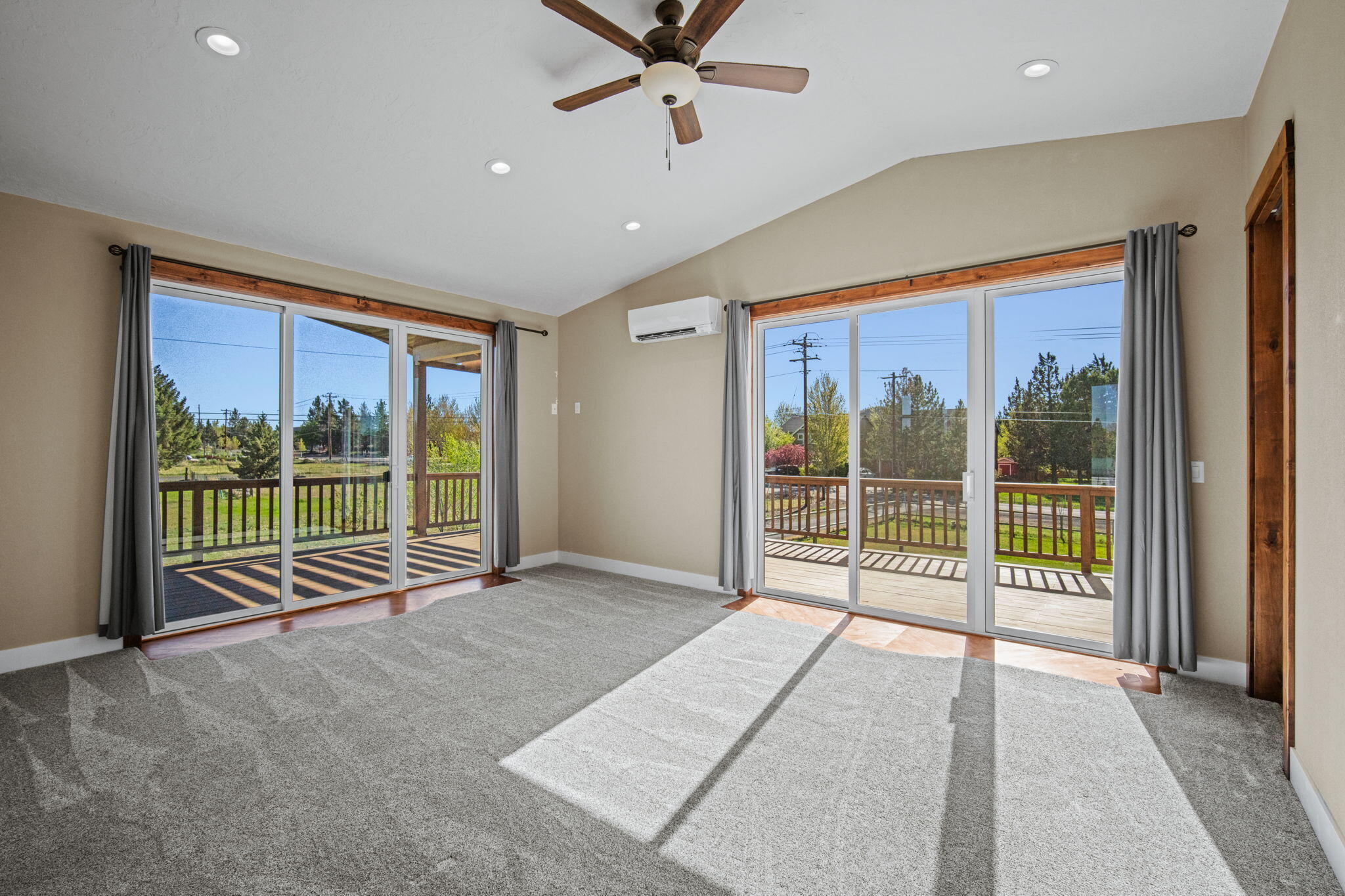 62466 Eagle Road Bend, OR 97701 - Photo 46 of 93 a view of an empty room with a balcony