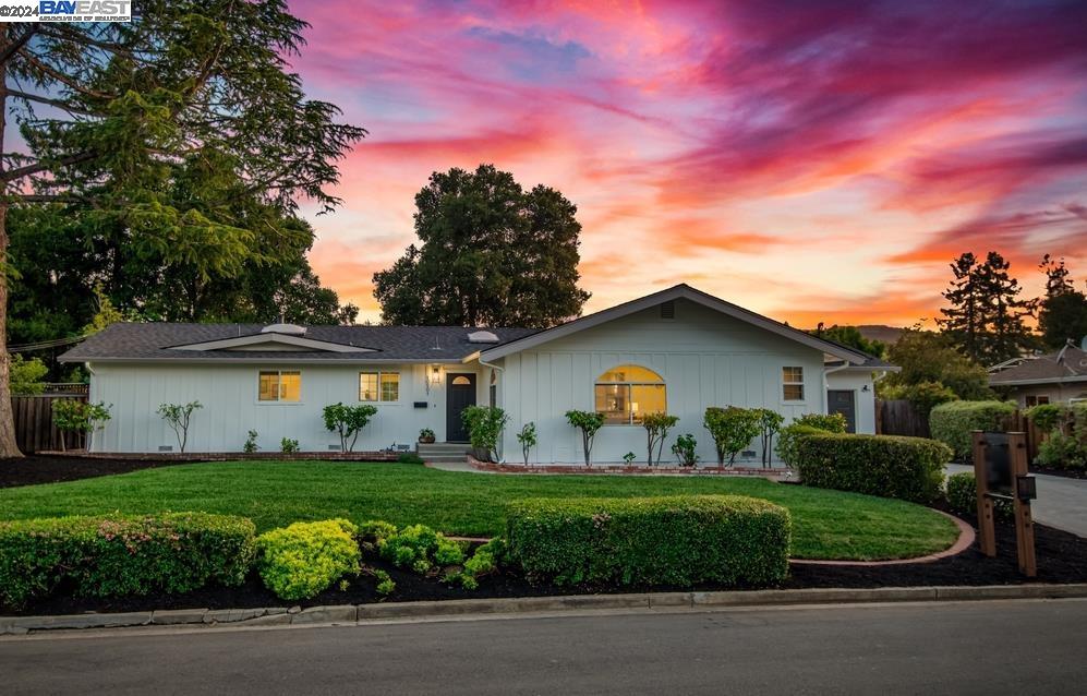 a house view with a garden space