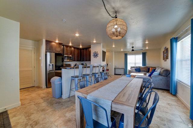 3853 South Red Valley Circle, Unit 22A1 Moab, UT 84532 - Photo 6 of 28 Dining area with suspended lighting and a ceiling fan