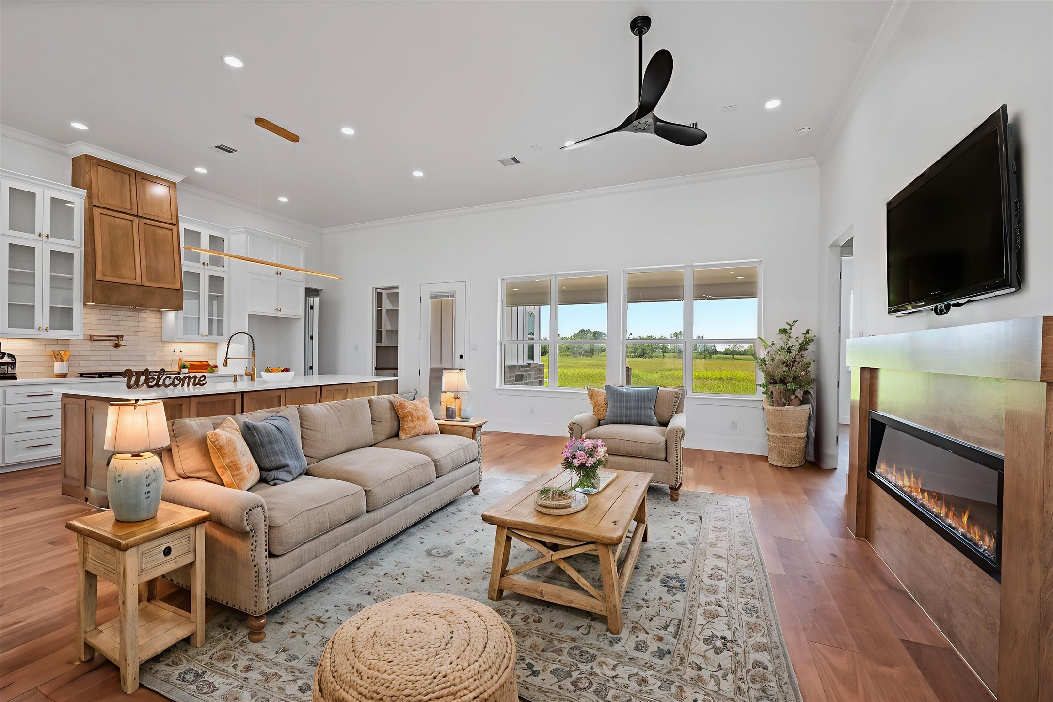 413 Chuckwagon Trail Angleton, TX 77515 - Photo 18 of 46 a living room with fireplace furniture and a flat screen tv